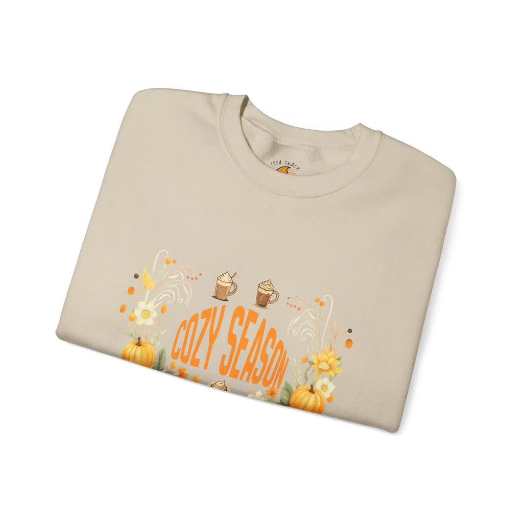 Beige sweatshirt with 'Cozy Season' text, pumpkins, sunflowers, and autumn drinks design