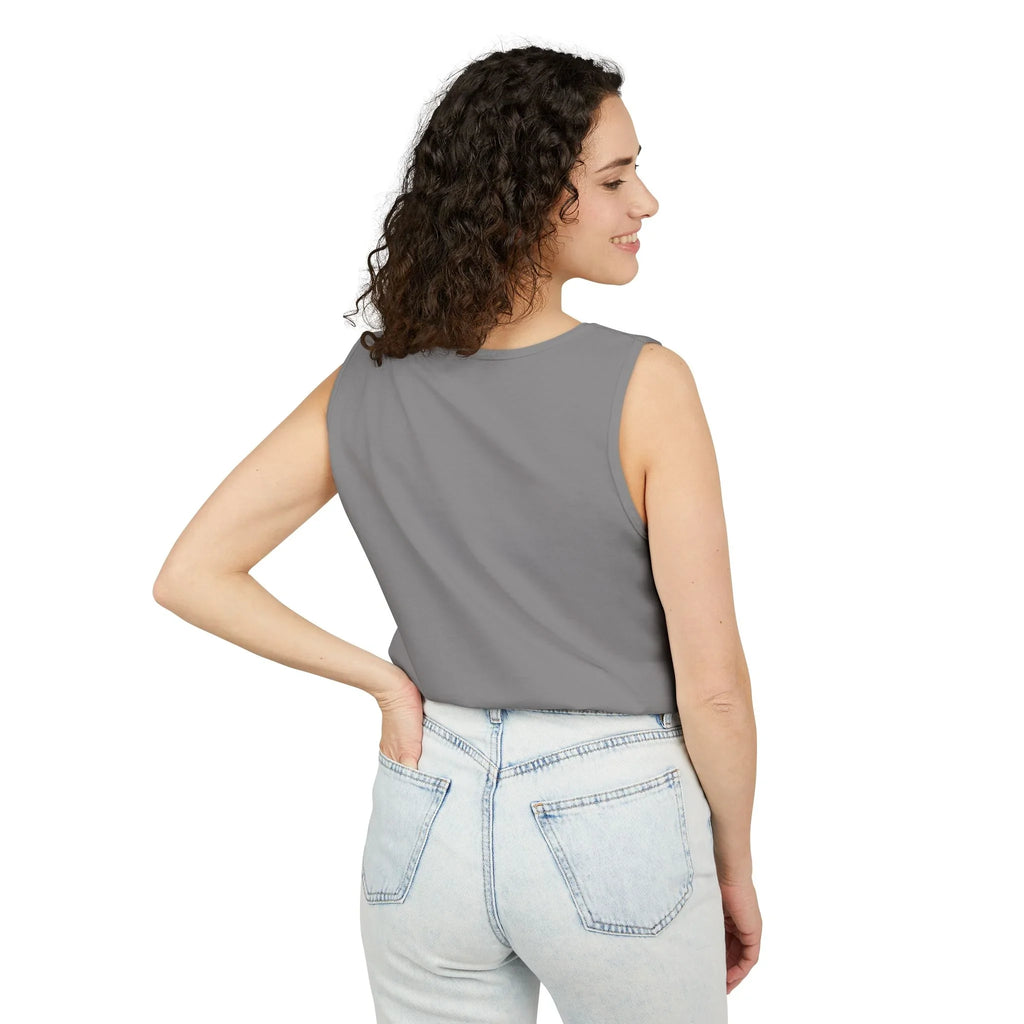 Woman wearing gray sleeveless top and light blue jeans, back view, white background