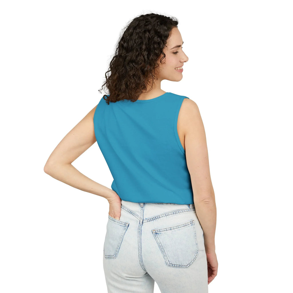 Woman modeling teal sleeveless top and light denim jeans, back view, on white background