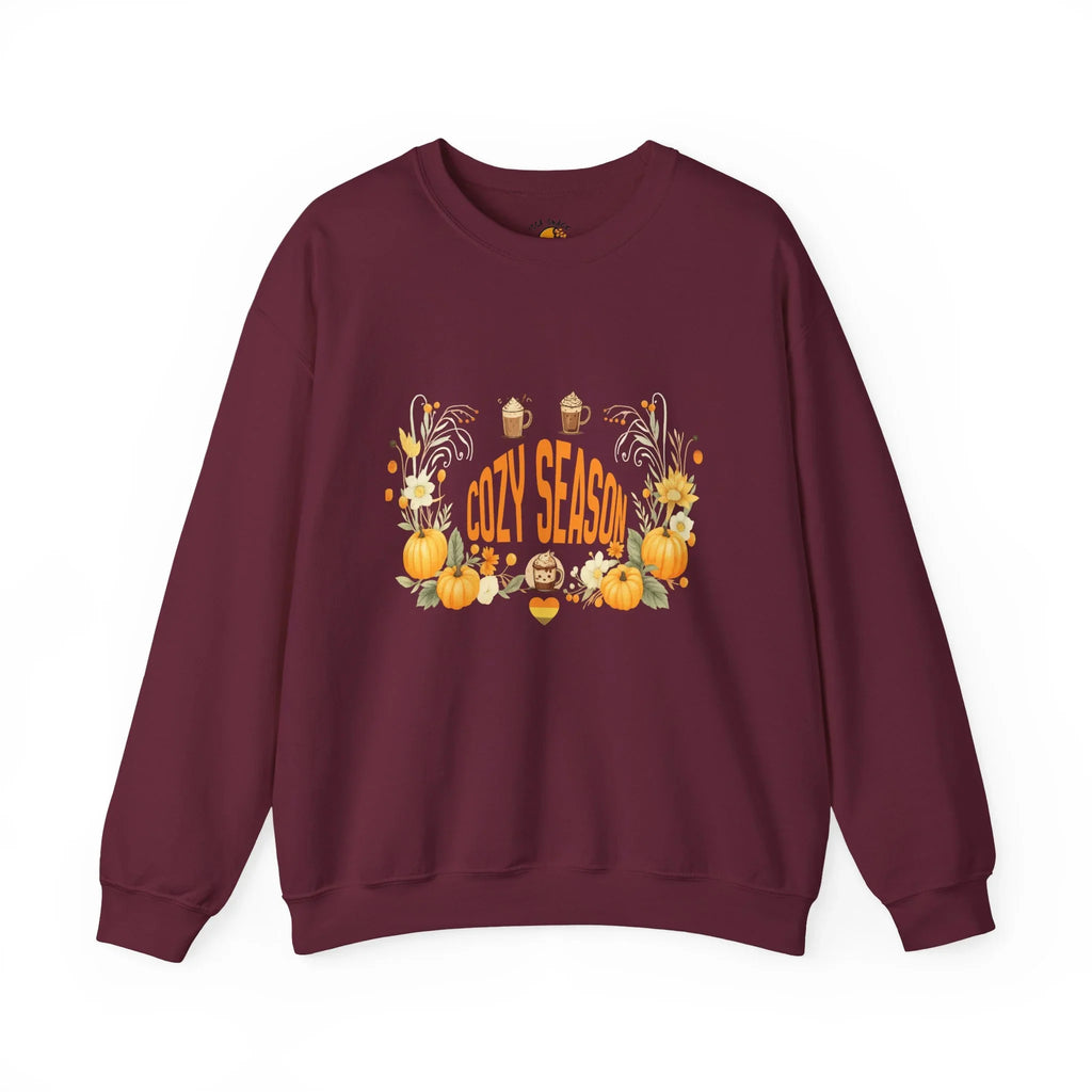 Burgundy sweatshirt with 'Cozy Season' text, pumpkins, flowers, and autumn designs.