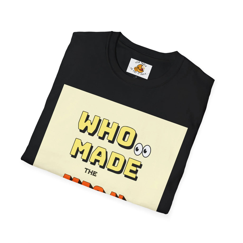 Folded black t-shirt with cartoon text reading 'WHO MADE' on a cream background