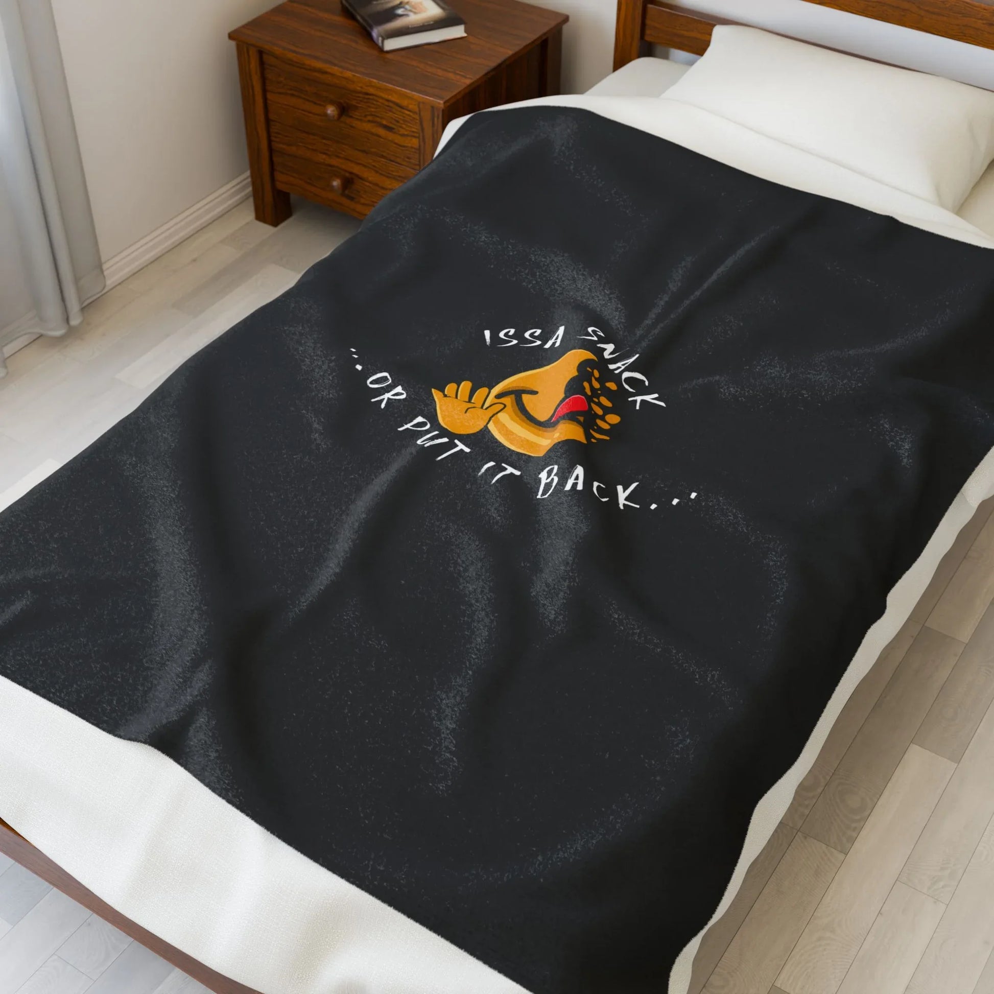 Black fleece blanket on bed with funny samosa cartoon and 'Issa Snack ...Or Put It Back' text